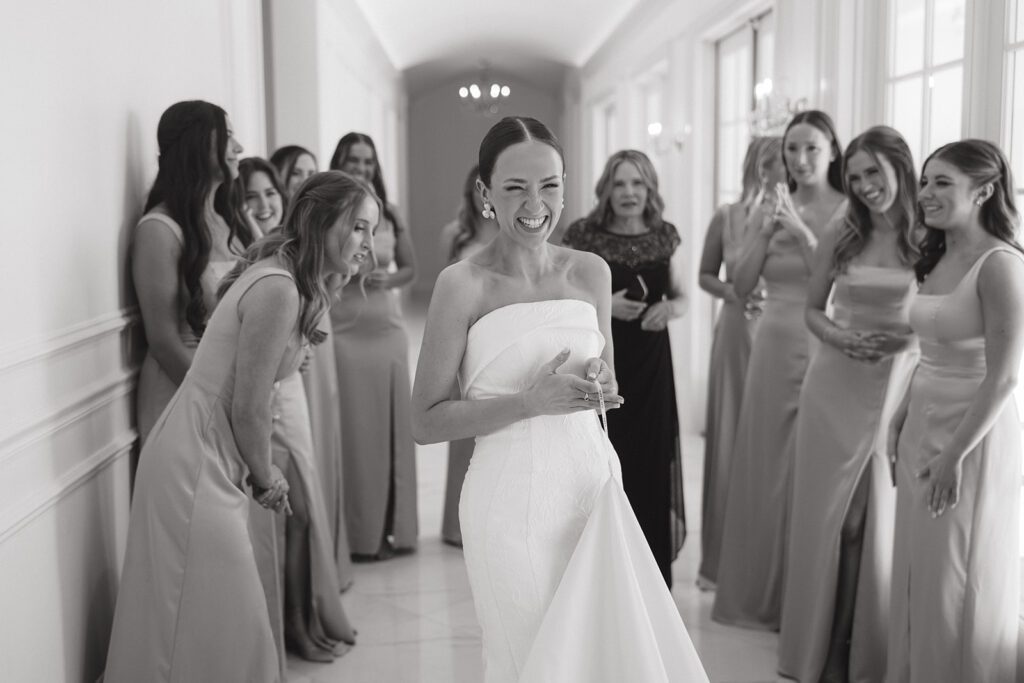 Bridesmaids first look in a hallway of the Hillside Estate